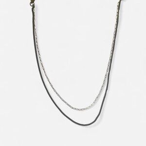 Layered gold and black necklace